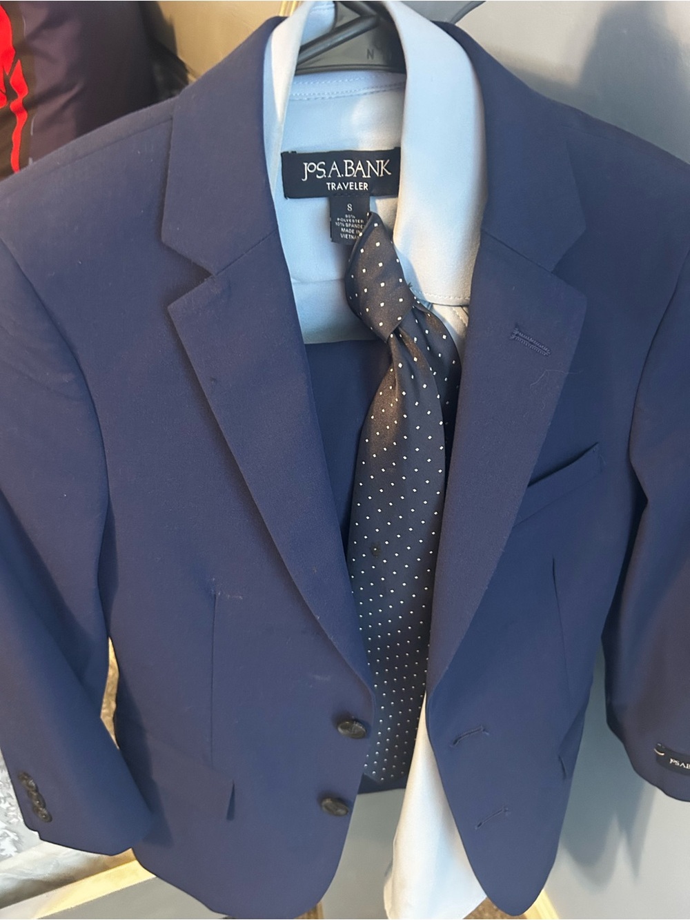 Jos. A. Bank Blue kids Blazer with Polka Dot Tie and blue pants .